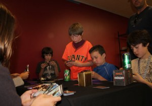 Kids playing Date Night Magic at D20 Games of Alameda