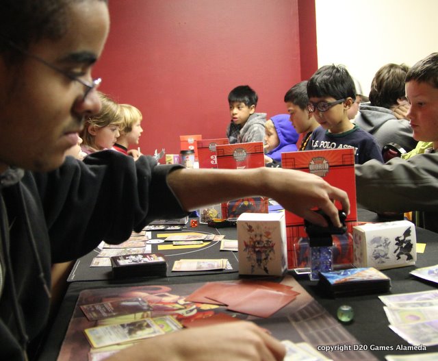 Players playing Pokemon at D20 Games in Alameda